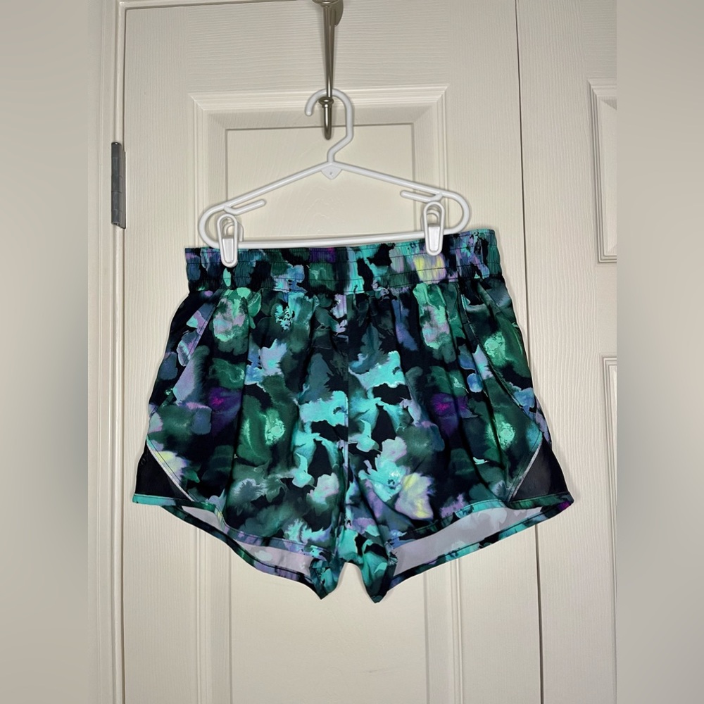 Green tie-dye-ish workout shorts